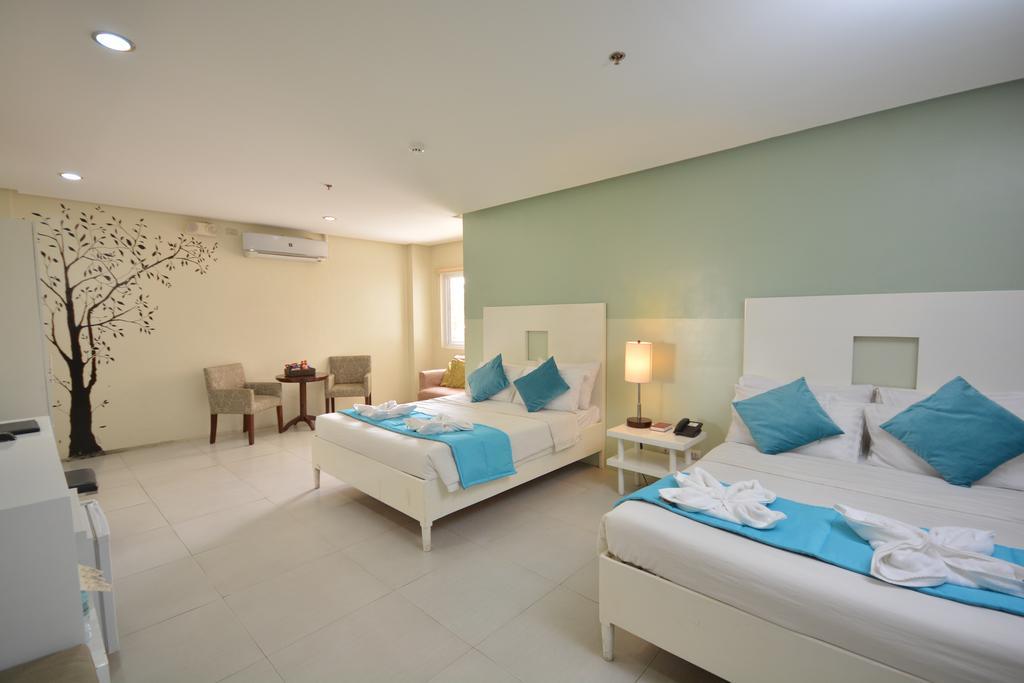 Empire Suites Hotel Puerto Princesa Exterior photo